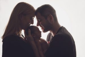 newborn baby photography backlit parents mum dad contrast