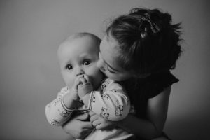 sibling baby photography black white