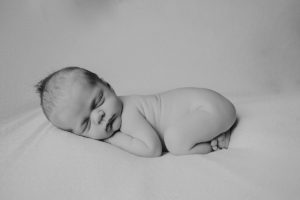 black white newborn baby photography curled posed pose