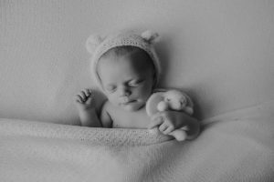 black white newborn baby photography curled posed pose