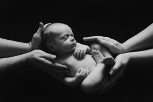 black white newborn baby photography hands parents mum dad