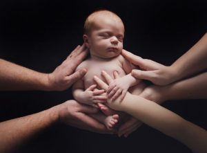 natural newborn baby photography black parents hands mum dad