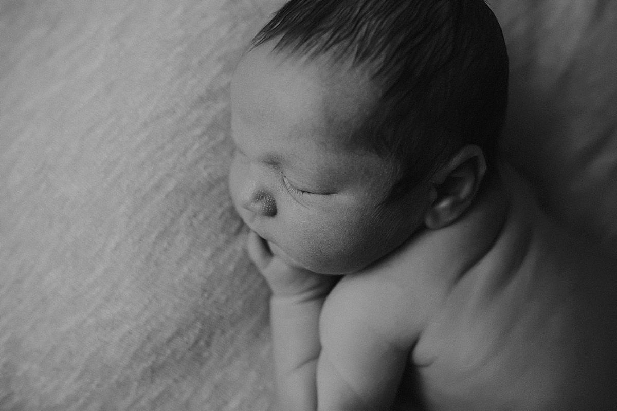 black and white newborn baby photography natural relaxed