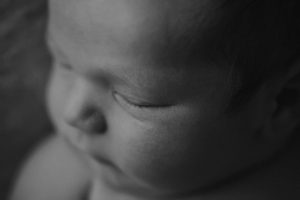 black and white newborn baby photography natural relaxed macro eyelashes