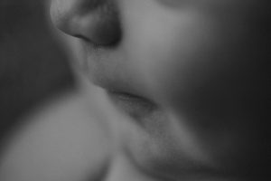 black and white newborn baby photography natural relaxed macro details features
