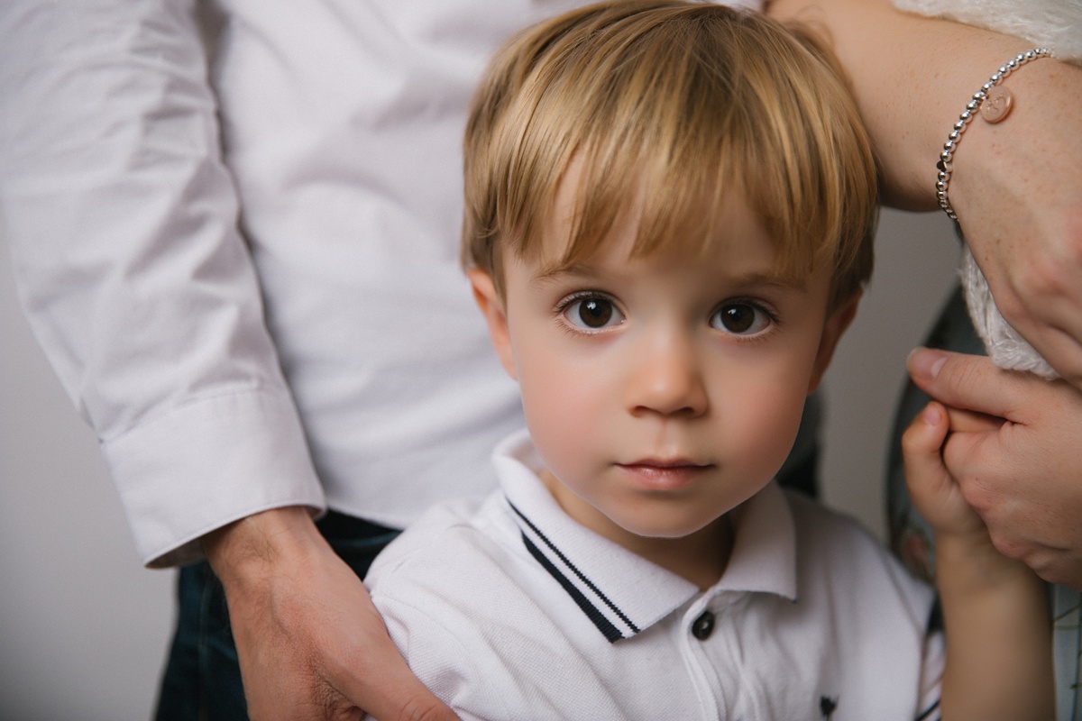 Older sibling baby photography session