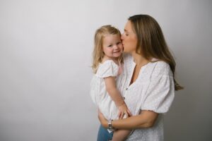 Older sibling baby photography session
